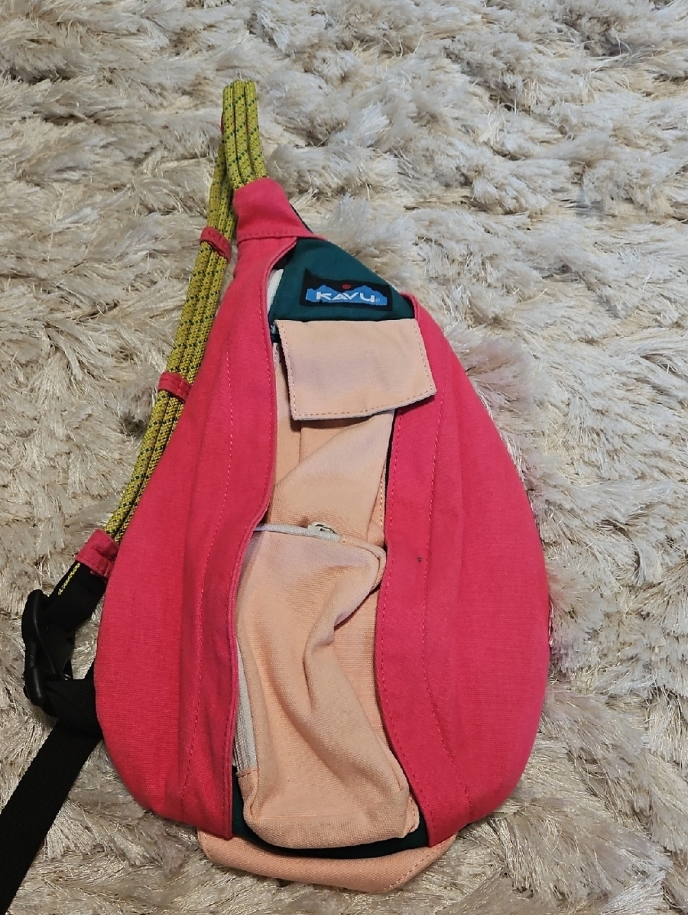 Kavu Pink Crossbody Sling with Peach Front Pocket and Yellow-Green Strap